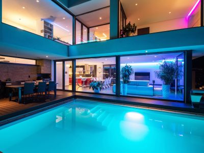 Modern,Villa,With,Colored,Led,Lights,At,Night.,Nobody,Inside